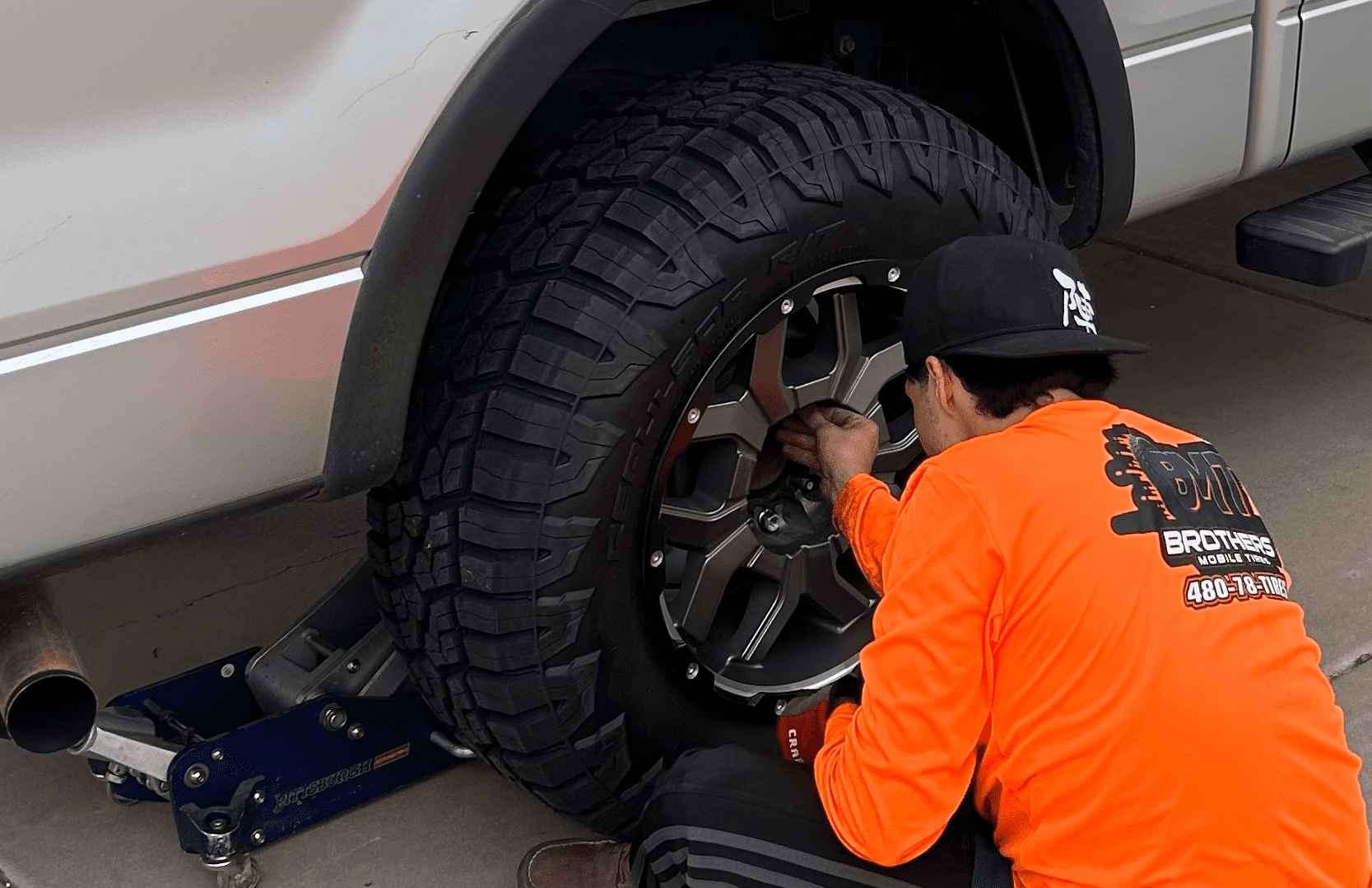 Brothers Mobile Tires technician servicing a wheel on location